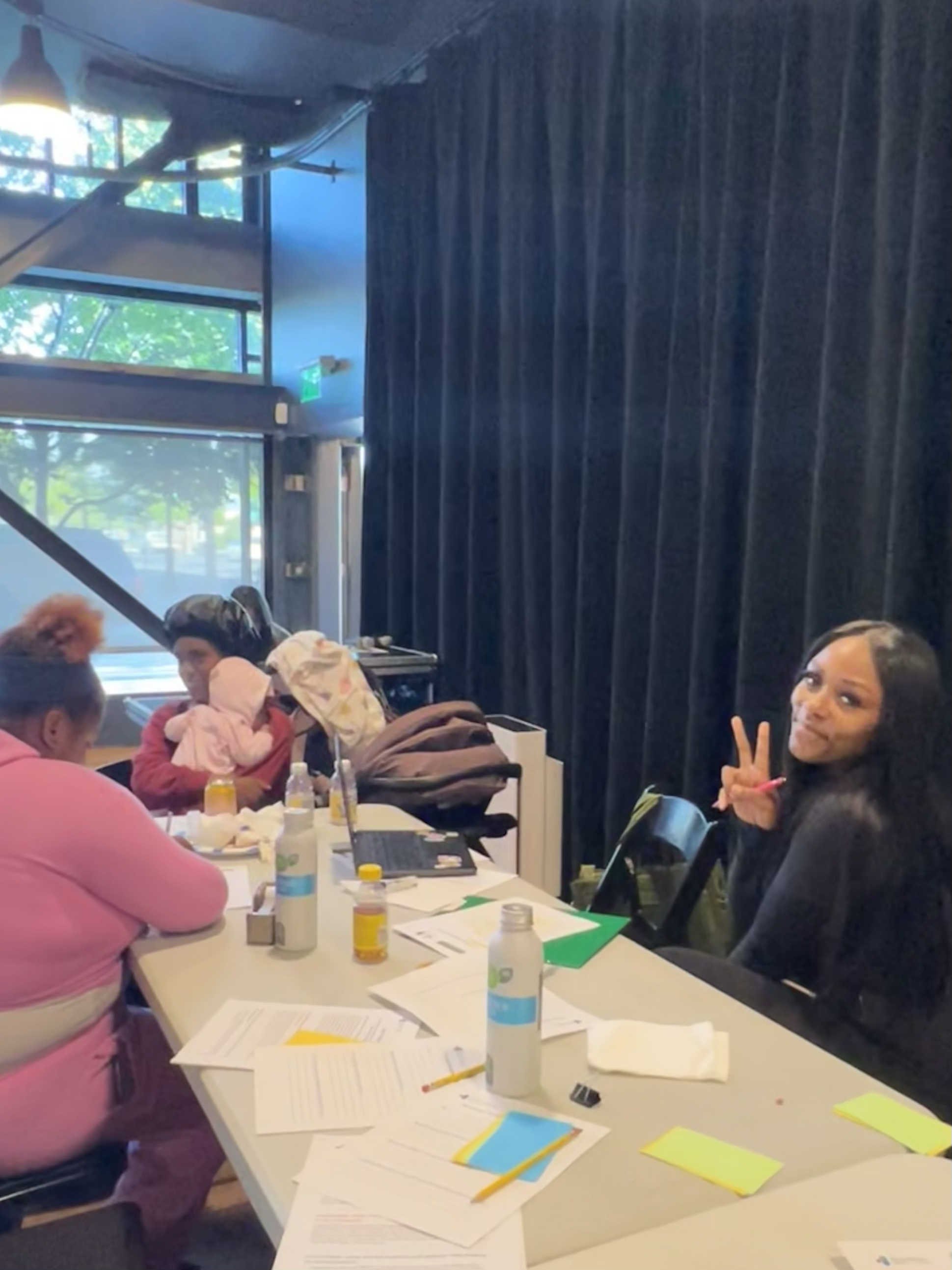 Residents in a small-group discussion at a community planning event.